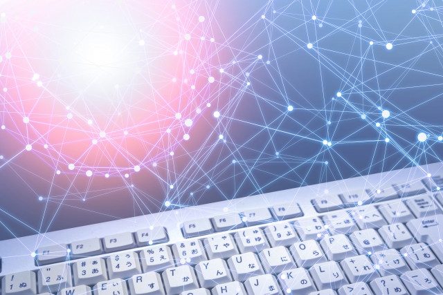 白いキーボードとネットワークのイメージ